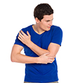 man holding his bones to show that moringa is beneficial for maintaining healthy bones man holding his bones to show that moringa is beneficial for maintaining healthy bones