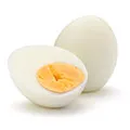 Boiled egg with a boiled egg infront showing half cut yolk and whites