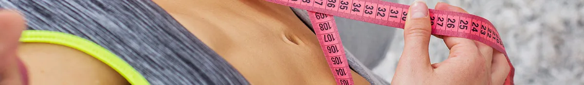 banner showing a woman with a flat stomach measuring her waist