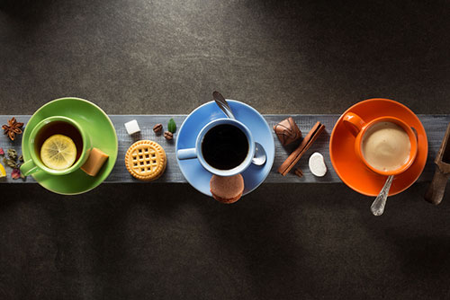image of three different types of coffees in mugs to show which spices to add for benefits