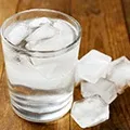 an image of a glass of cold water which is said to help the fat burning process