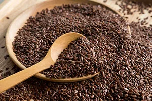bowl of overloaded flaxseeds with a spoon