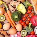 table which a bunch or different fruits and vegetables