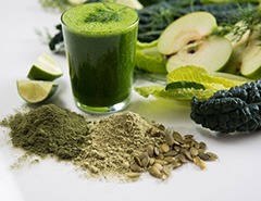 image of different green fruits and vegetables and powders