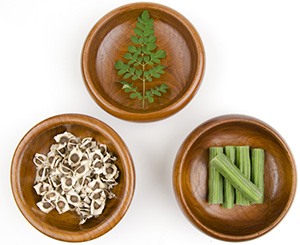 three bowls of foods that are healthy including moringa