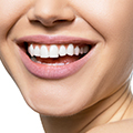 woman showing her teeth to show that moringa maintains strong and healthy teeth woman showing her teeth to show that moringa maintains strong and healthy teeth