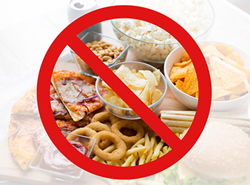 image showing foods that are high in carbs and a red restricted sign over it image showing foods that are high in carbs and a red restricted sign over it