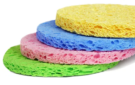 different colours of circular sponges to show different types of natural Konjac Sponges available