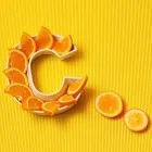 Oranges sliced and placed in the shape of a C