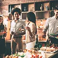 man and woman at a bar to show how to relax to safe yourself from illness