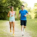 two young man and woman running to show healthy lifestyle