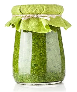 glass jar of spirulina extract in it covered with cloth and elastic band glass jar of spirulina extract in it covered with cloth and elastic band