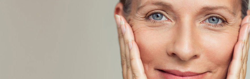 Woman Gently Massaging Face