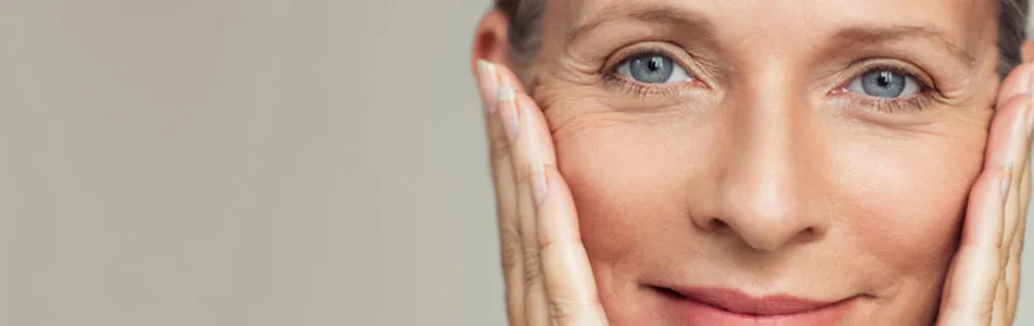 Woman Gently Massaging Face