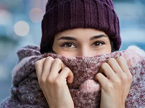 Woman Wearing A Hat And Scarf