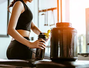 Woman Working Out At The Gym